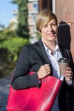 Outdoor portrait of a beautiful lady on the street wearing forma stock photo Outdoor portrait of a beautiful lady on the street wearing forma stock photo
