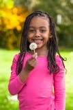 Outdoor portrait of a cute young black girl - African people Royalty Free Stock Images Outdoor portrait of a cute young black girl - African people Royalty Free Stock Images
