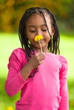 Outdoor portrait of a cute young black girl - African people Stock Photos Outdoor portrait of a cute young black girl - African people Stock Photos