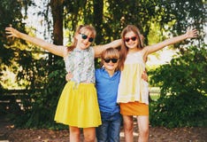 Outdoor portrait of 3 funny kids playing together royalty free stock photos Outdoor portrait of 3 funny kids playing together royalty free stock photos