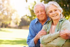 Outdoor Portrait Of Loving Senior Couple