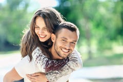 Outdoors portrait of lovers happy young man and woman stock photography Outdoors portrait of lovers happy young man and woman stock photography