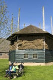 Outfitting cyclists and historic hay barn royalty free stock image Outfitting cyclists and historic hay barn royalty free stock image