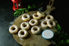 Oven Baked Holiday Donuts With Creamy Vanilla Frosting - With Holiday Decorations Royalty Free Stock Photography