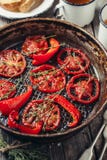 Oven-baked tomatoes with thyme Stock Photo Oven-baked tomatoes with thyme Stock Photo