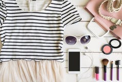 Overhead view of womens cloths shirt and accessories royalty free stock photo Overhead view of womens cloths shirt and accessories royalty free stock photo
