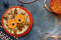 Owl cake. Halloween or birthday party dessert, delicious cream c