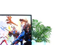 Оренбург, Россия, февраль 2019 n fortnite компютерной игры в наушниках и с кнюппелем, консолью игры, Sony Playstation 4 стоковое фото Оренбург, Россия, февраль 2019 n fortnite компютерной игры в наушниках и с кнюппелем, консолью игры, Sony Playstation 4 стоковое фото
