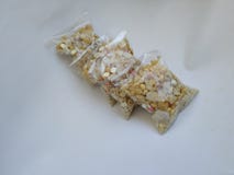 Plastic Pack of ellu bella/Jaggery and Sesame Seeds sweet mixture to share during Sankranti or pongal festival in Karnataka