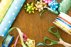 Packaging gifts on a wooden table. Birthday, decoration, christmas and hanukkah concept royalty free stock photography Packaging gifts on a wooden table. Birthday, decoration, christmas and hanukkah concept royalty free stock photography