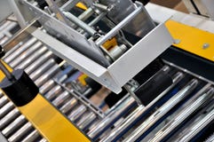 Packaging Machine Of Manufacturing Stock Photos