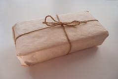 Packaging made of handmade Kraft paper wrapped with twine royalty free stock photos Packaging made of handmade Kraft paper wrapped with twine royalty free stock photos
