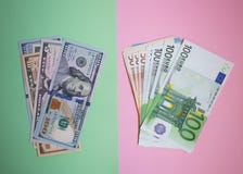 pacote ascendente próximo de Euros do dinheiro e de dólares das cédulas no fundo da cor fotografia de stock pacote ascendente próximo de Euros do dinheiro e de dólares das cédulas no fundo da cor fotografia de stock