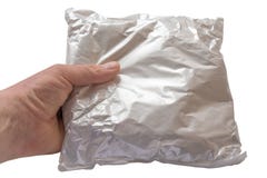 Pacote postal branco na mão do homem fotografia de stock royalty free Pacote postal branco na mão do homem fotografia de stock royalty free