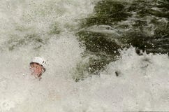 Paddler do caiaque de Whitewater Imagem de Stock Royalty Free Paddler do caiaque de Whitewater Imagem de Stock Royalty Free