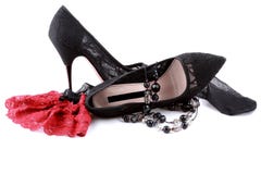 Pair Of Black Lace Shoes With Stocking And Beads Royalty Free Stock Images