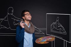 Palett och målning för inspirerad stilig man hållande royaltyfri foto Palett och målning för inspirerad stilig man hållande royaltyfri foto