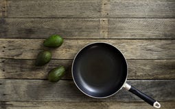 Pan With Fruit Avocado On Kitchen table royalty free stock image Pan With Fruit Avocado On Kitchen table royalty free stock image