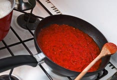 Pan With Tomato Sauce Stock Photos