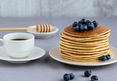 Pancakes with blueberries on a neutral background. stock images Pancakes with blueberries on a neutral background. stock images