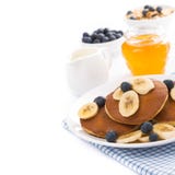 Pancakes With Banana And Blueberry, Yogurt And Muesli, Isolated Royalty Free Stock Images Pancakes With Banana And Blueberry, Yogurt And Muesli, Isolated Royalty Free Stock Images