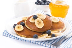 Pancakes With Banana, Honey And Blueberries, Isolated Stock Image