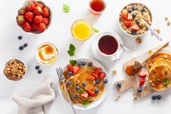 Pancakes With Blueberry Strawberry Honey And Quinoa For Breakfast Stock Images