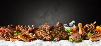 Panorama banner of grilled meat from a winter BBQ