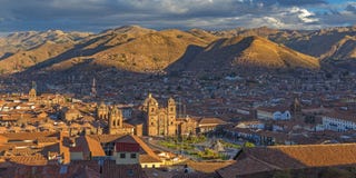 Panorama de ville de Cusco au coucher du soleil, Pérou photo stock Panorama de ville de Cusco au coucher du soleil, Pérou photo stock
