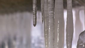 Panorama frame Close up view of smooth and shiny icicles under a bridge in winter stock photo Panorama frame Close up view of smooth and shiny icicles under a bridge in winter stock photo