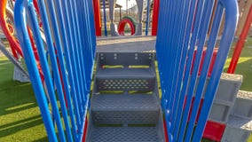 Panorama frame Stairs going up a slide overlooking mountain and bright sky on a sunny day royalty free stock image Panorama frame Stairs going up a slide overlooking mountain and bright sky on a sunny day royalty free stock image