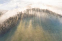 Panorama Of A Forest Shrouded By Low Clouds. Rays Of The Sun. Autumn Weather Stock Images