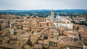 Panoramic view of the city of Siena and the Siena Cathedral stock photo Panoramic view of the city of Siena and the Siena Cathedral stock photo