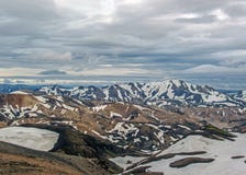 Colorful rhyolite mountains covered with snow in Jokultungur geothermal area, Laugavegur, Fjallabak Nature Reserve, Highlands of stock images Colorful rhyolite mountains covered with snow in Jokultungur geothermal area, Laugavegur, Fjallabak Nature Reserve, Highlands of stock images
