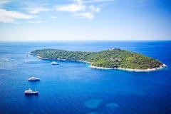 Panoramic view of Lokrum Island Dalmatian Coast of Adriatic Sea in Dubrovnik. Blue sea with white yachts, beautiful landscape, royalty free stock images Panoramic view of Lokrum Island Dalmatian Coast of Adriatic Sea in Dubrovnik. Blue sea with white yachts, beautiful landscape, royalty free stock images