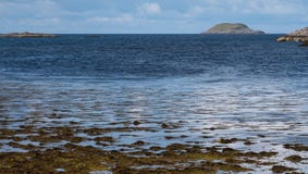 Panoramic view of the Scottish Highlands looking out to sea near Lochinver, north west coast of Scotland. royalty free stock photography Panoramic view of the Scottish Highlands looking out to sea near Lochinver, north west coast of Scotland. royalty free stock photography