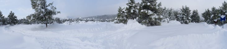 Panoramic view Wonderful winter with lots of snow and snow drifts in a Greek village on the island of Evia, Greece royalty free stock images Panoramic view Wonderful winter with lots of snow and snow drifts in a Greek village on the island of Evia, Greece royalty free stock images
