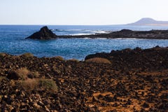 Panoramischer Meerblick Vulkan, schwarze Felsen Versanden Sie Makro Sun-Strahl in den Fjorden horizont Stockfotos Panoramischer Meerblick Vulkan, schwarze Felsen Versanden Sie Makro Sun-Strahl in den Fjorden horizont Stockfotos