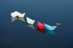 Paper Boats On Water Stock Photo