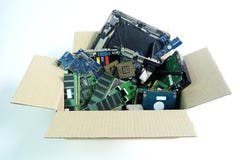 Paper box with Computer Hardware part electronic waste isolated on white royalty free stock image Paper box with Computer Hardware part electronic waste isolated on white royalty free stock image
