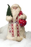 Paper-mache Santa Claus toy (with fir and sack) Stock Images Paper-mache Santa Claus toy (with fir and sack) Stock Images