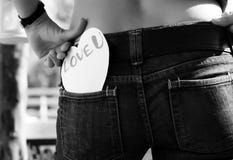 Paper valentine in the back pocket royalty free stock photography Paper valentine in the back pocket royalty free stock photography