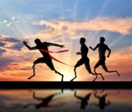 Paralympics runner with prostheses and one run to crossing finish line stock photography Paralympics runner with prostheses and one run to crossing finish line stock photography