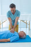 Paramedic performing resuscitation on patient royalty free stock image Paramedic performing resuscitation on patient royalty free stock image