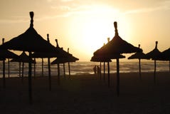 Parasols Of Mallorca In Sunset Royalty Free Stock Images