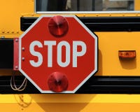 Pare la muestra en el autobús escolar Foto de archivo libre de regalías Pare la muestra en el autobús escolar Foto de archivo libre de regalías
