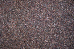 Parede pequena do cascalho, casas usadas como um fundo imagens de stock Parede pequena do cascalho, casas usadas como um fundo imagens de stock