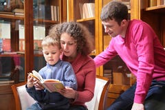 Parents read book with son royalty free stock photo Parents read book with son royalty free stock photo