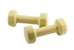 Pares de pesas de gimnasia amarillas claras para la aptitud imagen de archivo libre de regalías Pares de pesas de gimnasia amarillas claras para la aptitud imagen de archivo libre de regalías