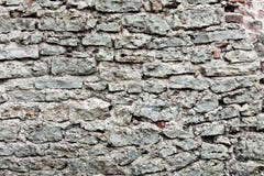 Parete di grandi pietre e dei mattoni rotti fotografia stock Parete di grandi pietre e dei mattoni rotti fotografia stock